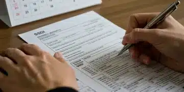 Person filling out 2026 disability benefit forms for SSDI SSI