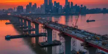 Modern highway bridge construction at sunset, symbolizing infrastructure development.